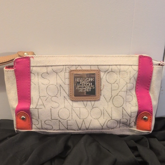 Victoria's Secret Handbags - Victoria's Secret White Clutch with Pink and Orange Accents